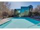 Community pool area with sleek, modern architecture at 50 E Serene Ave # 123, Las Vegas, NV 89123