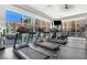 Bright fitness center featuring treadmills, overlooking an outdoor pool area at 50 E Serene Ave # 123, Las Vegas, NV 89123