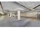 Spacious parking garage with designated spots and visible utility systems, providing secure vehicle storage at 50 E Serene Ave # 123, Las Vegas, NV 89123