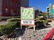 Manhattan Condominiums complex map and signage at entrance with stone ground cover at 50 E Serene Ave # 123, Las Vegas, NV 89123