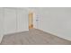 Bright bedroom with neutral carpet and closet providing ample storage space at 5394 Swenson St # 29, Las Vegas, NV 89119