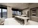 Bright, modern kitchen with a long island, bar seating, and high-end appliances at 563 Rock Peak Dr, Henderson, NV 89012