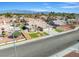 An aerial view shows a well-maintained neighborhood and meticulously landscaped home at 6316 Canyon Ridge Dr, Las Vegas, NV 89108