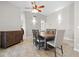 Cozy dining room with an elegant light fixture and seating for six, great for gatherings at 6316 Canyon Ridge Dr, Las Vegas, NV 89108