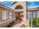 Inviting front entrance showcases double doors and desert landscaping around the walkway at 6316 Canyon Ridge Dr, Las Vegas, NV 89108