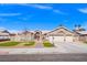 Charming home with manicured lawn, paved walkway and a three-car garage at 6316 Canyon Ridge Dr, Las Vegas, NV 89108