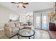 Open concept living room with a wet bar and views of the kitchen at 6316 Canyon Ridge Dr, Las Vegas, NV 89108