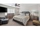 Cozy main bedroom with a ceiling fan, dresser and two nightstands at 6316 Canyon Ridge Dr, Las Vegas, NV 89108