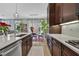 Well-designed kitchen with stainless steel appliances, and white countertops at 6489 Little Harbor Ct, Las Vegas, NV 89141