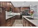 Modern kitchen with stainless steel appliances, a center island and stylish cabinetry at 6489 Little Harbor Ct, Las Vegas, NV 89141