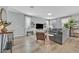 Bright living room with modern furniture, stylish decor, and a large window at 6489 Little Harbor Ct, Las Vegas, NV 89141