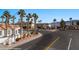 Beautiful Desert community homes with lush palm trees and plenty of space for vehicle parking at 701 Aztec Cir, Mesquite, NV 89027