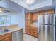 Kitchen featuring stainless steel refrigerator and ample cabinet space at 7117 Shadow Crest Dr, Las Vegas, NV 89119