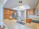 Kitchen featuring stainless steel appliances, wood cabinets and breakfast bar at 7117 Shadow Crest Dr, Las Vegas, NV 89119