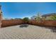 Private backyard features brick pavers and mature landscaping at 7433 Calzado Dr, Las Vegas, NV 89178