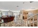 Spacious living room with hardwood floors, ceiling fan, and abundant natural light at 7433 Calzado Dr, Las Vegas, NV 89178