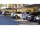 Covered parking area with multiple parked cars in a well-maintained community at 7950 W Flamingo Rd # 1139, Las Vegas, NV 89147