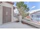 Private balcony with metal railing and views of the neighborhood at 8404 Bay Crest Dr, Las Vegas, NV 89128