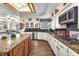 Modern kitchen featuring granite countertops, stainless steel appliances, and an island with bar seating at 8404 Bay Crest Dr, Las Vegas, NV 89128