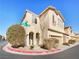 Charming two-story home with stucco exterior, two car garage, and desert landscaping at 8452 Viansa Loma Ave, Las Vegas, NV 89149