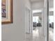 Hallway leading to a living area, tiled floors, and a closet at 10708 Clear Meadows Dr, Las Vegas, NV 89134