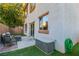 Backyard with easy-care turf and patio seating area for outdoor enjoyment at 10852 Avenzano St, Las Vegas, NV 89141