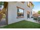 Backyard featuring easy-care turf, patio, and access to a secure side yard at 10852 Avenzano St, Las Vegas, NV 89141