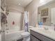 Bright bathroom featuring a shower and tub combination, vanity and modern fixtures at 1525 Spiced Wine Ave # 19103, Henderson, NV 89074