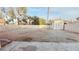 Spacious backyard of home needing landscape with storage shed at 1612 Olive Palm Cir, Las Vegas, NV 89128