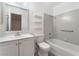 A bathroom with a bathtub, toilet, and vanity at 228 N Bruce St # D, Las Vegas, NV 89101