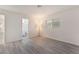 A bedroom with access to a bathroom and wood flooring at 228 N Bruce St # D, Las Vegas, NV 89101
