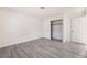 An empty bedroom with wood flooring and closet at 228 N Bruce St # D, Las Vegas, NV 89101