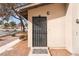 Front view of entrance to home featuring a security door at 228 N Bruce St # D, Las Vegas, NV 89101