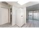 Hallway with access to the kitchen and sliding glass doors at 228 N Bruce St # D, Las Vegas, NV 89101