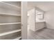 Hallway with access to the kitchen, and new floors at 228 N Bruce St # D, Las Vegas, NV 89101