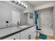 Updated bathroom with granite vanity, bright lighting, and a shower-tub combination at 2300 E Silverado Ranch Blvd # 2162, Las Vegas, NV 89183