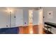 Bedroom view with hardwood floors, natural light, and doorway to bathroom at 2300 E Silverado Ranch Blvd # 2162, Las Vegas, NV 89183