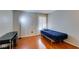 Cozy bedroom with hardwood floors, natural light, and a minimalist design at 2300 E Silverado Ranch Blvd # 2162, Las Vegas, NV 89183