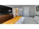 Bedroom view with hardwood floors, natural light, and a doorway to bathroom at 2300 E Silverado Ranch Blvd # 2162, Las Vegas, NV 89183