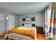 Bedroom featuring a comfortable bed, stylish decor, and bright natural light through a large window at 2300 E Silverado Ranch Blvd # 2162, Las Vegas, NV 89183