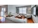 Inviting living room with hardwood floors, modern furniture and a sliding door to the balcony at 2300 E Silverado Ranch Blvd # 2162, Las Vegas, NV 89183