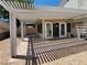 Back patio featuring a pergola and entrance to the sunroom at 2451 Muirfield Ave, Henderson, NV 89074