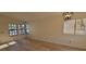 Bright and airy living room features hardwood floors and stylish lighting at 2451 Muirfield Ave, Henderson, NV 89074