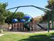Fun playground area with colorful slides, climbing structures, and safety surfacing for children to enjoy at 2451 Muirfield Ave, Henderson, NV 89074