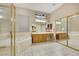 Primary bathroom featuring a soaking tub, walk-in shower, double sinks and a make-up vanity at 2725 Cool Lilac Ave, Henderson, NV 89052