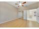 Bedroom featuring wood floors, a closet, and neutral paint at 2725 Cool Lilac Ave, Henderson, NV 89052