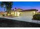 Charming single-story home with a three-car garage and well-maintained landscaping at 2725 Cool Lilac Ave, Henderson, NV 89052