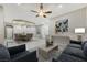 Open-concept layout with a dining and living area, complete with recessed lighting and neutral tones at 2725 Cool Lilac Ave, Henderson, NV 89052