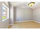 Cozy bedroom with vaulted ceilings, a window seat offering natural light, and a neutral color scheme at 3665 S Pointe Cir, Laughlin, NV 89029