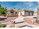 Charming single-story home featuring a well-manicured yard and an attached two-car garage at 3665 S Pointe Cir, Laughlin, NV 89029